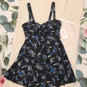Petite.Bloomchic. One piece swimsuit. Size 10. (NWT)Black. 82% polyester 💕